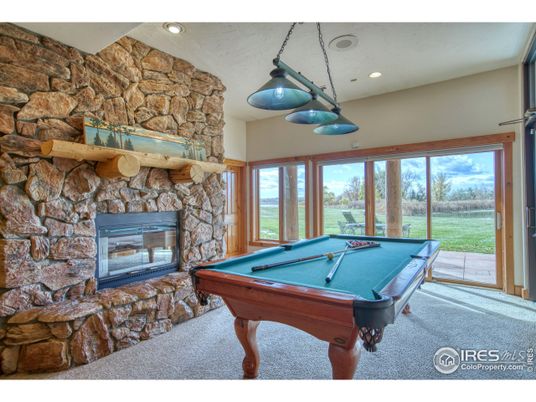 Billiard Table, Fireplace, Game Room, Interior, Pendant Lights, Recessed Lighting, Stone Walls