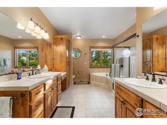 Bathroom, Dual Sink Vanities, Glass Shower, Interior, Recessed Lighting, Tile Countertops
