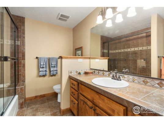 Bathroom, Dual Sink Vanities, Glass Shower, Interior, Tile Countertops