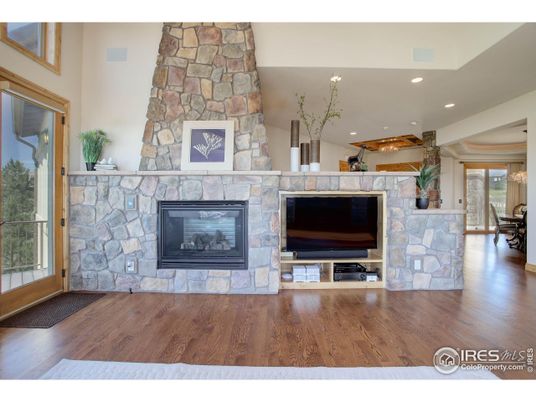Fireplace, Interior, Recessed Lighting, Stone Walls, Wood Texture Flooring