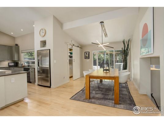 Dining room, Interior, Kitchen, Recessed Lighting, Stainless Steel Appliances, Wood Texture Flooring