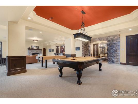 Billiard Table, Chandelier, Fireplace, Game Room, Interior, Pendant Lights, Recessed Lighting, Stone Walls