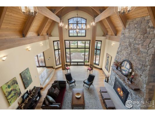 Chandelier, Fireplace, Interior, Living room, Stone Walls, Wooden Beams, Wooden Ceilings, Wood Texture Flooring