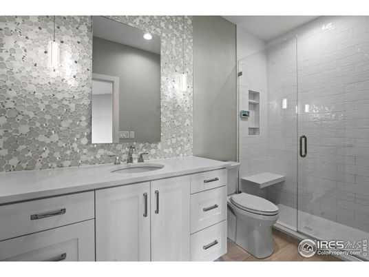 Bathroom, Glass Shower, Interior, Pendant Lights, Recessed Lighting, Wood Texture Flooring