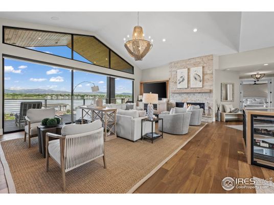 Fireplace, Interior, Living room, Pendant Lights, Recessed Lighting, Stone Walls, Wood Texture Flooring
