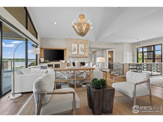 Chandelier, Fireplace, Home Office, Interior, Living room, Pendant Lights, Recessed Lighting, Wood Texture Flooring
