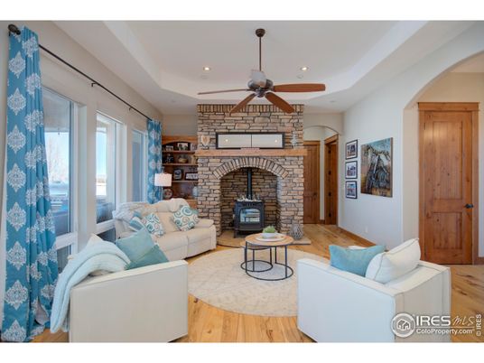 Fireplace, Interior, Living room, Recessed Lighting, Stone Walls, Wood Texture Flooring