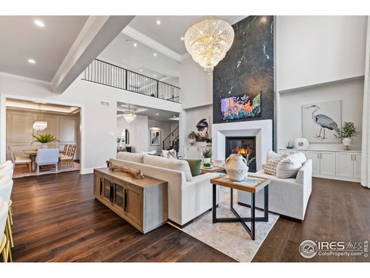 Chandelier, Dining room, Fireplace, Interior, Living room, Recessed Lighting, Wood Texture Flooring