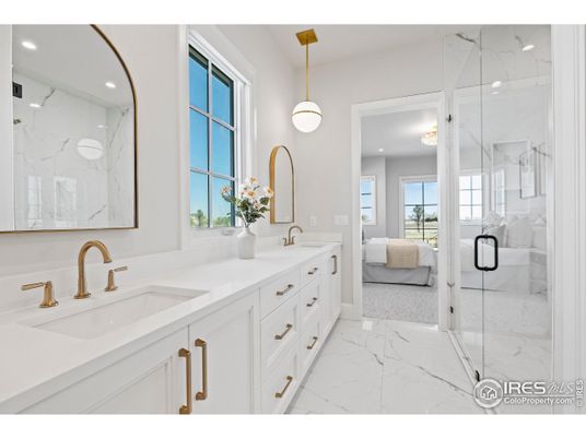 Bathroom, Bedroom, Dual Sink Vanities, Glass Shower, Interior, Marble, Marble Walls, Pendant Lights, Recessed Lighting