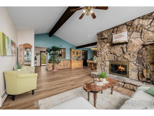 Chandelier, Fireplace, Interior, Living room, Stone Walls, Wooden Beams, Wood Texture Flooring