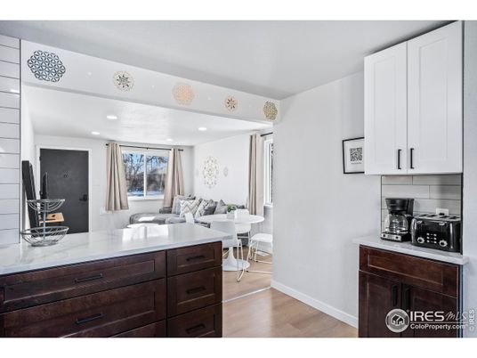 Dining room, Interior, Kitchen, Living room, Recessed Lighting, Stainless Steel Appliances, Wood Texture Flooring