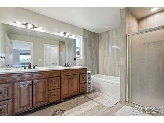 Bathroom, Dual Sink Vanities, Glass Shower, Interior, Recessed Lighting, Wood Texture Flooring