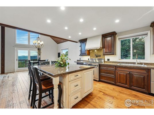 Chandelier, Dining room, Interior, Kitchen, Pendant Lights, Recessed Lighting, Stainless Steel Appliances, Wood Texture Flooring