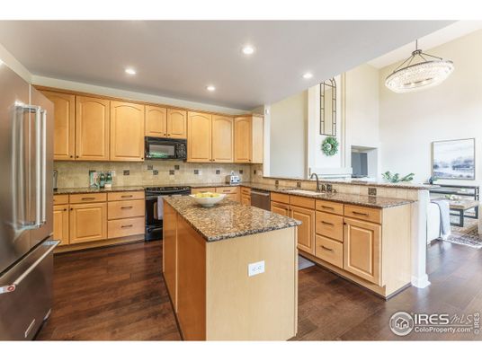 Chandelier, Interior, Kitchen, Recessed Lighting, Stainless Steel Appliances, Wood Texture Flooring
