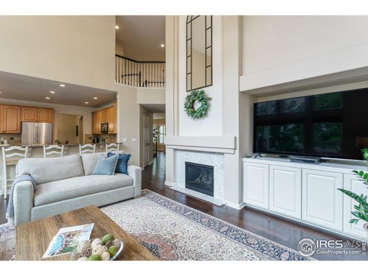 Fireplace, Interior, Kitchen, Living room, Recessed Lighting, Stainless Steel Appliances, Wood Texture Flooring