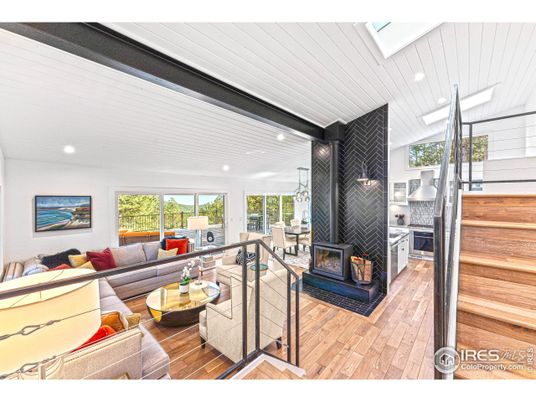 Dining room, Fireplace, Interior, Living room, Pendant Lights, Recessed Lighting, Wood Texture Flooring