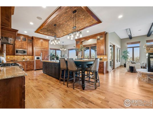 Fireplace, Interior, Kitchen, Pendant Lights, Recessed Lighting, Stainless Steel Appliances, Wood Texture Flooring
