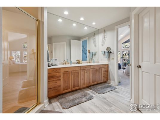 Bathroom, Dual Sink Vanities, Interior, Recessed Lighting, Wood Texture Flooring