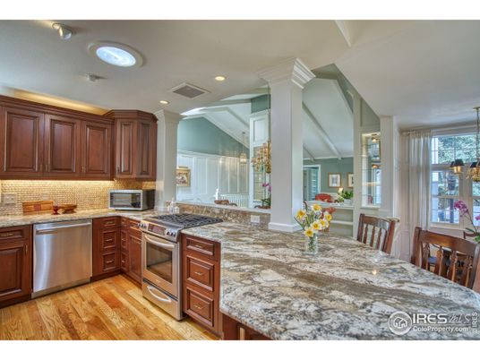 Dining room, Interior, Kitchen, Pendant Lights, Recessed Lighting, Stainless Steel Appliances, Wood Texture Flooring