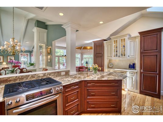 Chandelier, Interior, Kitchen, Pendant Lights, Recessed Lighting, Stainless Steel Appliances, Wood Texture Flooring
