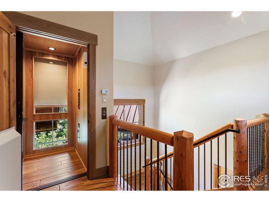 Elevator, Interior, Recessed Lighting, Wood Texture Flooring, Wooden Walls