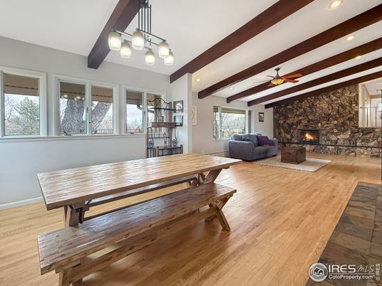 Dining room, Fireplace, Interior, Living room, Pendant Lights, Recessed Lighting, Stone Walls, Wooden Beams, Wood Texture Flooring