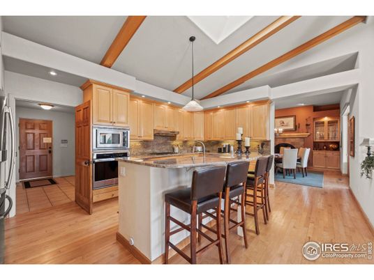 Dining room, Interior, Kitchen, Pendant Lights, Recessed Lighting, Stainless Steel Appliances, Wooden Beams, Wood Texture Flooring