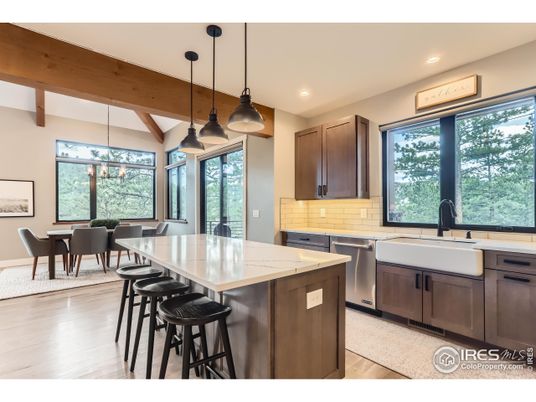 Dining room, Interior, Kitchen, Pendant Lights, Recessed Lighting, Stainless Steel Appliances, Wooden Beams, Wood Texture Flooring