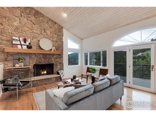 Fireplace, Interior, Living room, Recessed Lighting, Stone Walls, Wood Texture Flooring