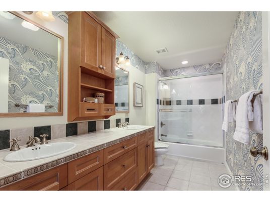 Bathroom, Dual Sink Vanities, Glass Shower, Interior, Recessed Lighting, Tile Countertops