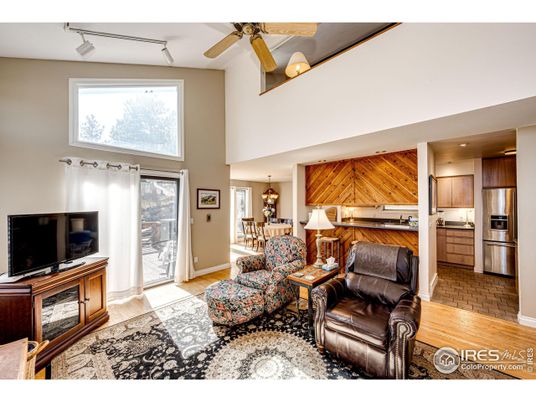 Chandelier, Dining room, Interior, Kitchen, Living room, Stainless Steel Appliances, Wood Texture Flooring