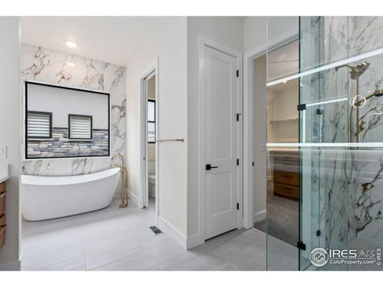 Bathroom, Free Standing Baths, Glass Shower, Interior, Marble Walls, Recessed Lighting