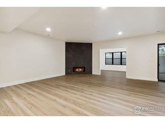 Empty room, Fireplace, Interior, Recessed Lighting, Wood Texture Flooring