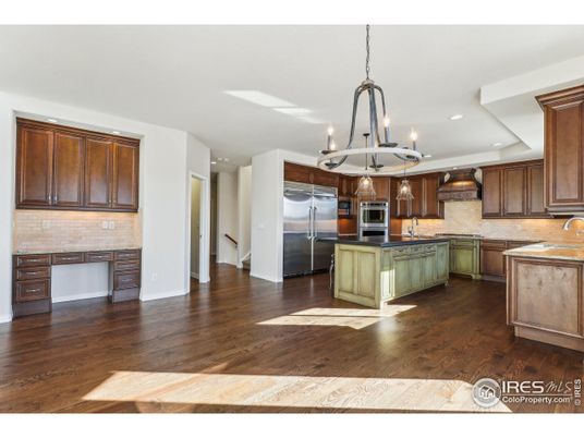 Chandelier, Interior, Kitchen, Pendant Lights, Recessed Lighting, Stainless Steel Appliances, Wood Texture Flooring