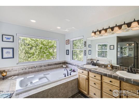 Bathroom, Dual Sink Vanities, Glass Shower, Interior, Recessed Lighting, Tile Countertops