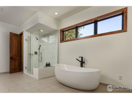 Bathroom, Free Standing Baths, Glass Shower, Interior, Marble Walls, Recessed Lighting