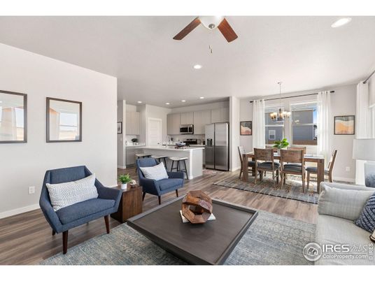 Chandelier, Dining room, Interior, Kitchen, Living room, Pendant Lights, Recessed Lighting, Stainless Steel Appliances, Wood Texture Flooring