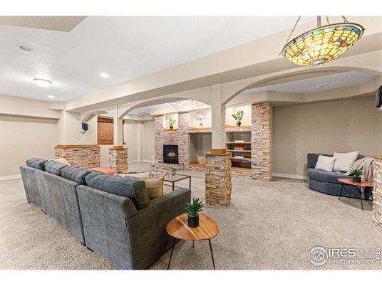 Fireplace, Interior, Living room, Pendant Lights, Recessed Lighting, Stone Walls