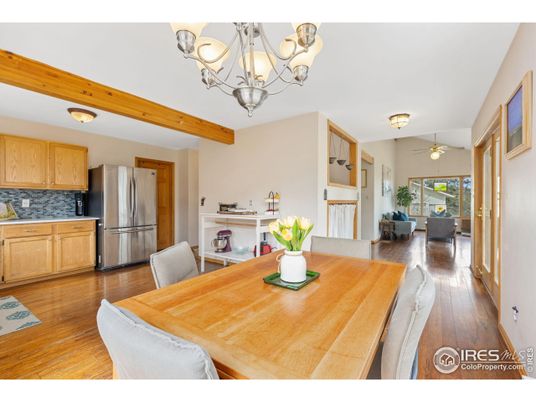 Chandelier, Dining room, Fireplace, Interior, Kitchen, Stainless Steel Appliances, Wooden Beams, Wood Texture Flooring