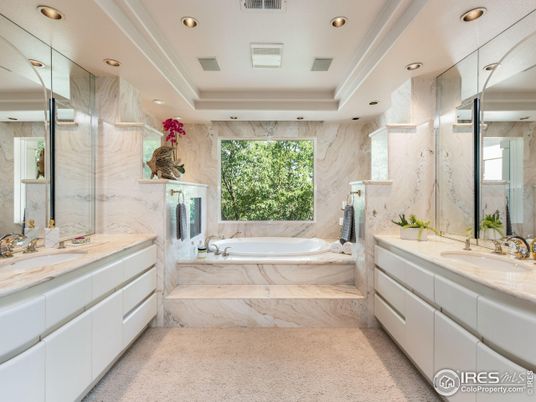 Bathroom, Dual Sink Vanities, Glass Shower, Interior, Marble Walls, Recessed Lighting