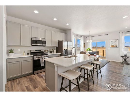 Chandelier, Dining room, Interior, Kitchen, Pendant Lights, Recessed Lighting, Stainless Steel Appliances, Water, Wood Texture Flooring