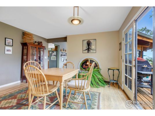 Dining room, Fireplace, Interior, Pendant Lights, Wood Texture Flooring