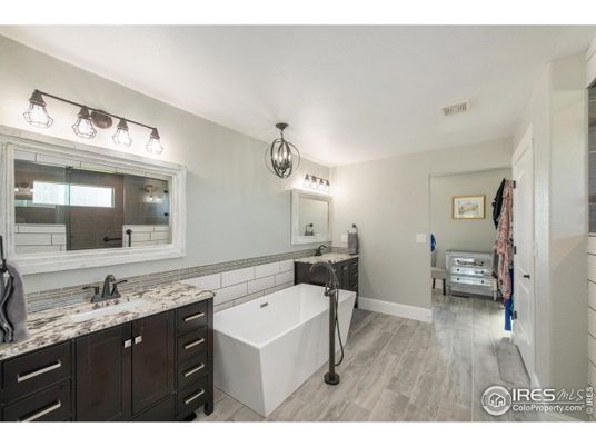 Bathroom, Dual Sink Vanities, Free Standing Baths, Interior, Wood Texture Flooring