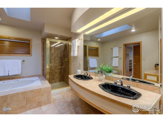 Bathroom, Dual Sink Vanities, Glass Shower, Interior, Recessed Lighting, Tile Countertops