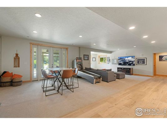 Dining room, Fireplace, Interior, Living room, Piano, Recessed Lighting, Wood Texture Flooring