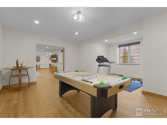 Billiard Table, Fitness Equipment, Game Room, Interior, Recessed Lighting, Wood Texture Flooring