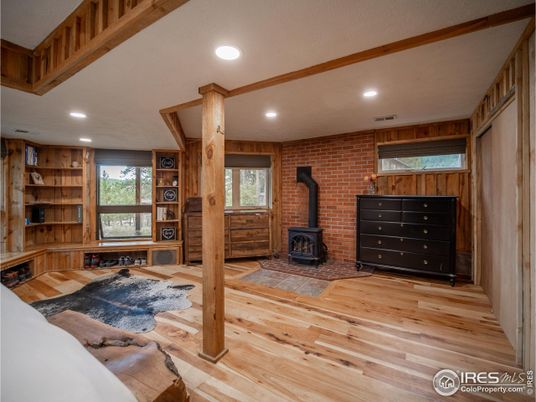 Fireplace, Interior, Recessed Lighting, Stone Walls, Wood Texture Flooring, Wooden Walls