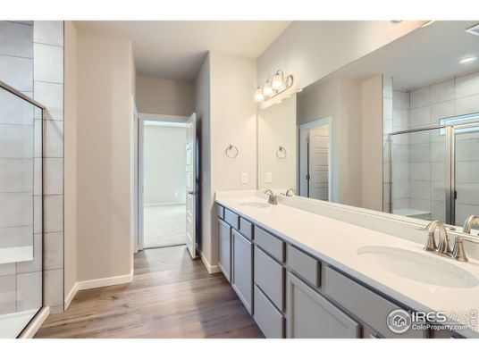 Bathroom, Dual Sink Vanities, Glass Shower, Interior, Recessed Lighting, Wood Texture Flooring