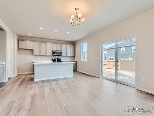 Chandelier, Interior, Kitchen, Recessed Lighting, Stainless Steel Appliances, Wood Texture Flooring