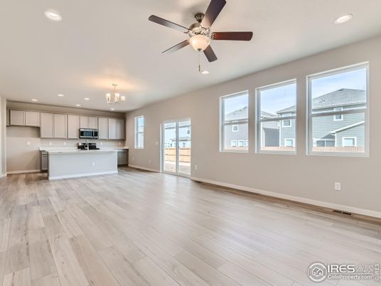 Chandelier, Empty room, Interior, Kitchen, Recessed Lighting, Stainless Steel Appliances, Wood Texture Flooring